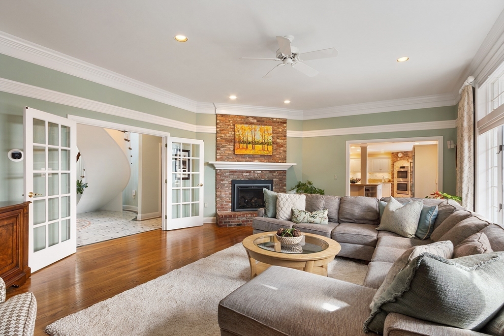 336 Lexington Road Concord, MA 01742 - Photo 10 of 41 a living room with furniture large window and wooden floor