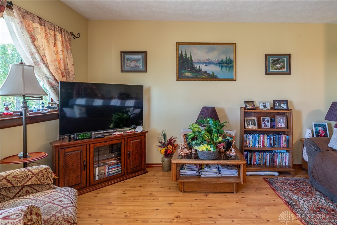 1599 Garringer Road Jamestown, OH 45335 - Photo 4 of 73 This warm and inviting space features gleaming wood floors and ample natural light.