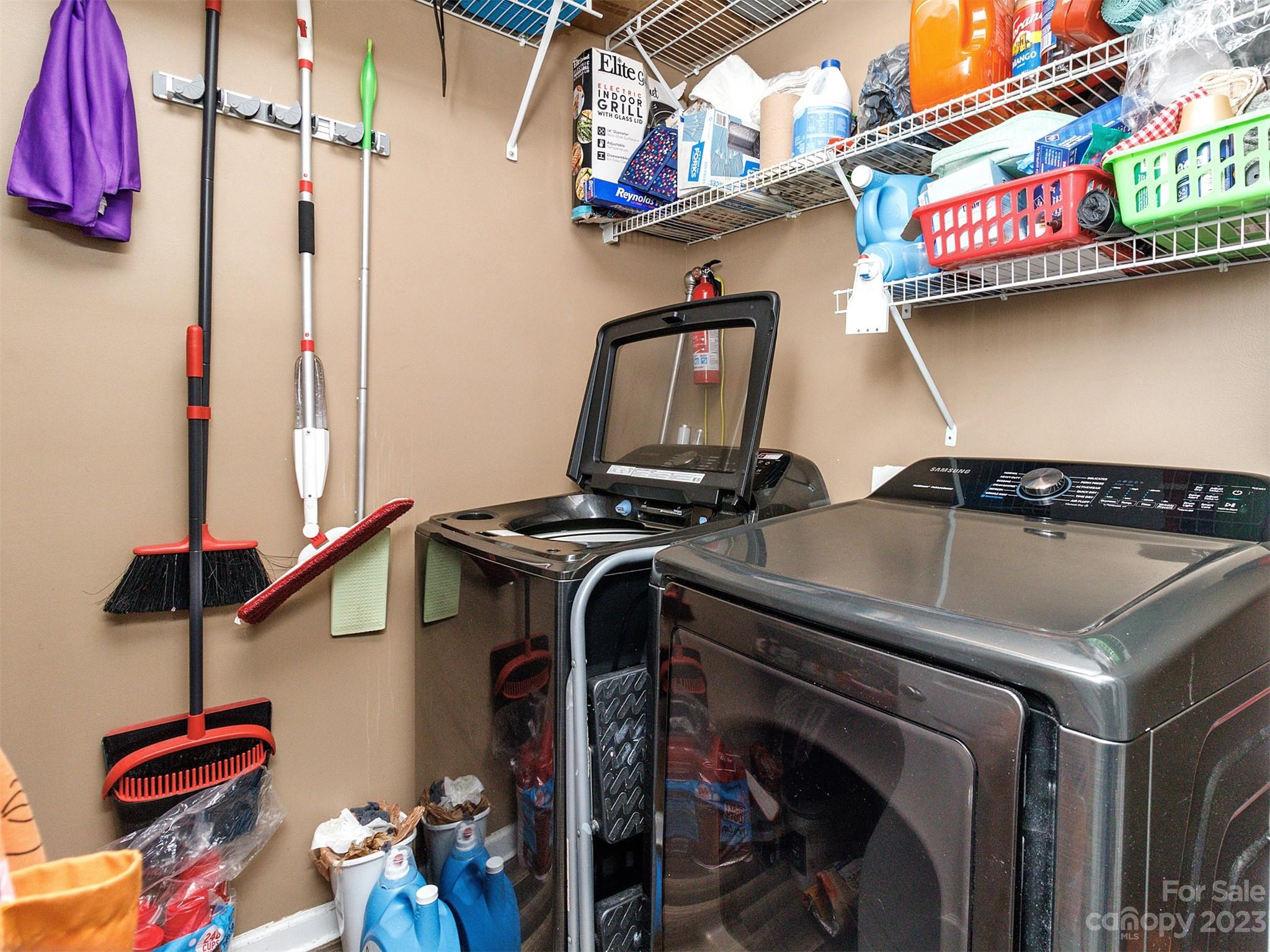 3053 Summerfield Ridge Lane Matthews, NC 28105 - Photo 20 of 37 a view of storage and utility room