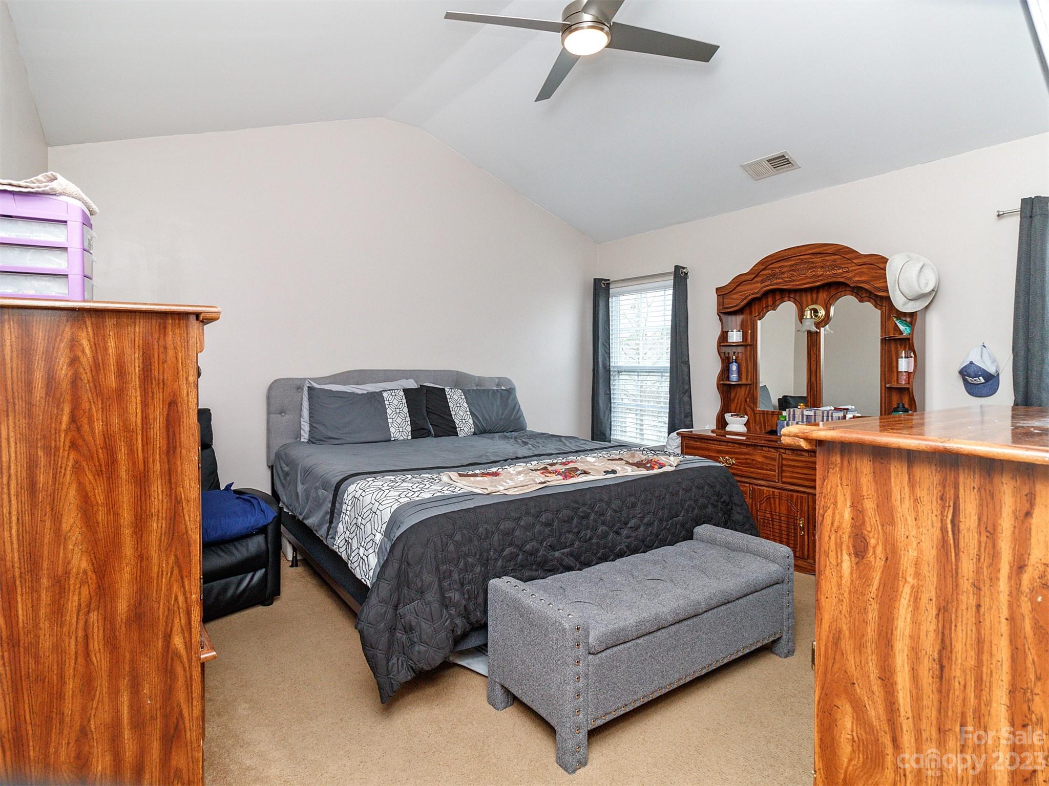 3053 Summerfield Ridge Lane Matthews, NC 28105 - Photo 22 of 37 a bedroom with a bed and window