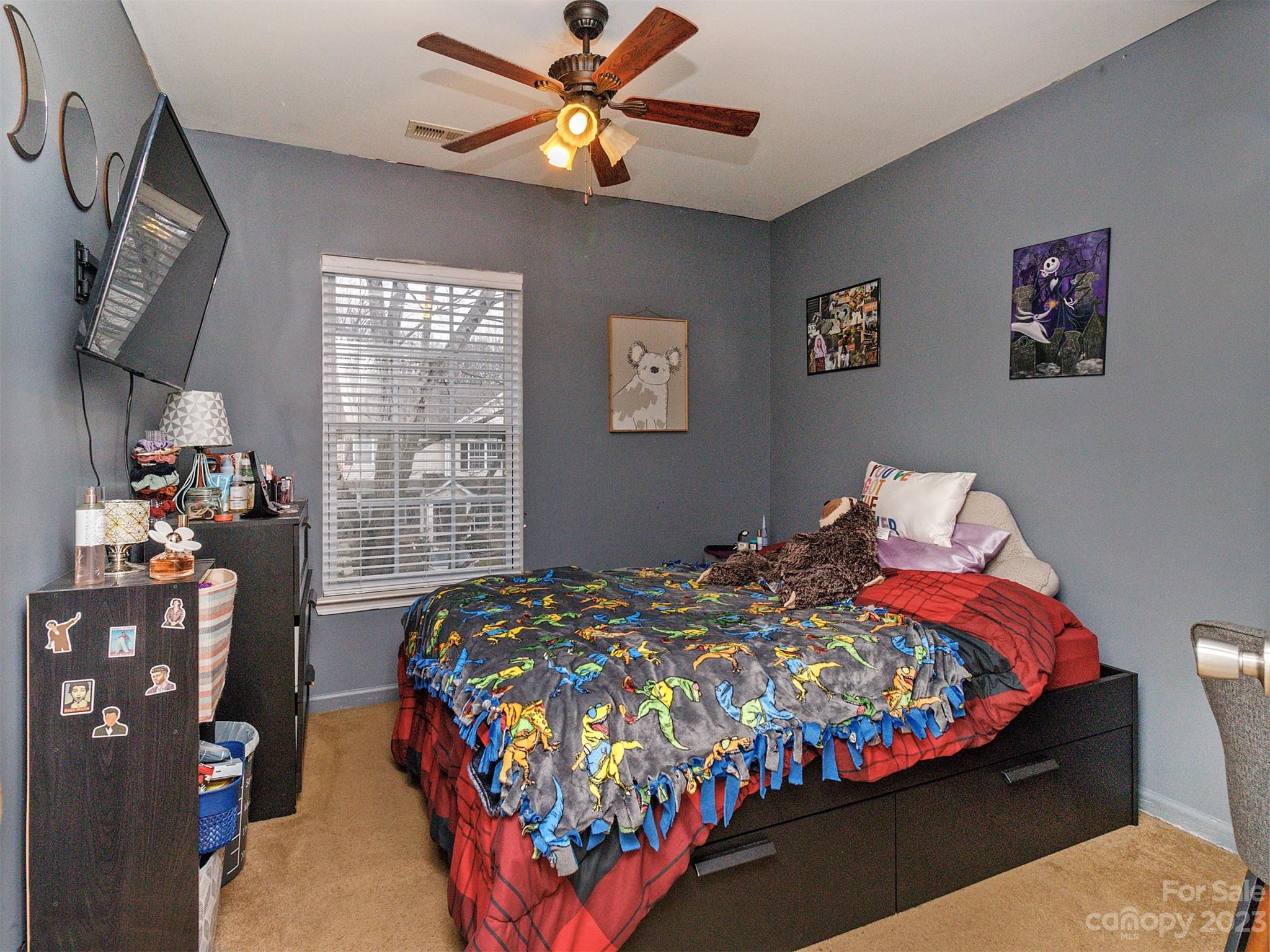 3053 Summerfield Ridge Lane Matthews, NC 28105 - Photo 31 of 37 a bedroom with bed and a window