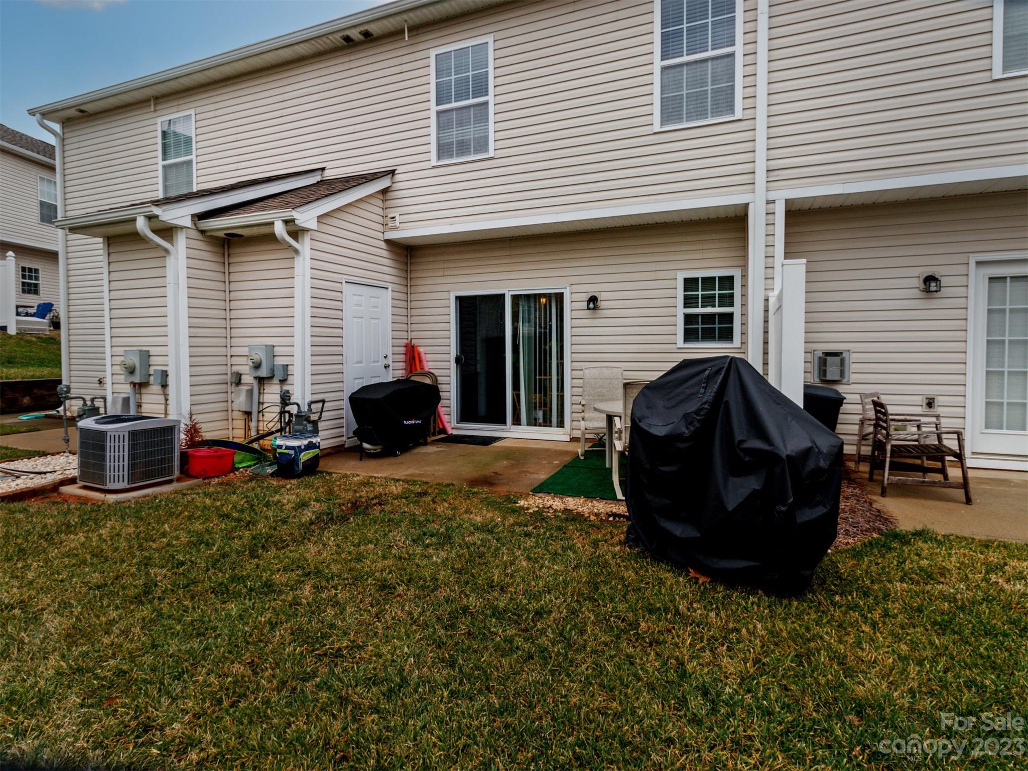 3053 Summerfield Ridge Lane Matthews, NC 28105 - Photo 35 of 37 a view of a back yard of the house