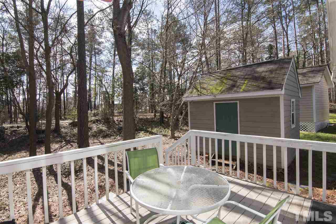 4416 Emmit Drive Raleigh, NC 27604 - Photo 20 of 28 a view of a chair and table in the balcony