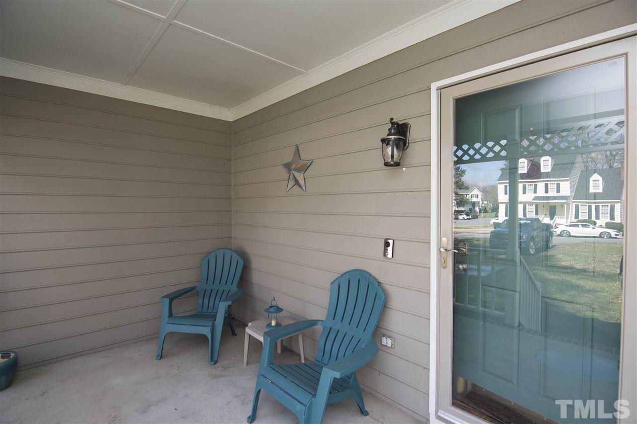 4416 Emmit Drive Raleigh, NC 27604 - Photo 4 of 28 a view of a door and chair in a room