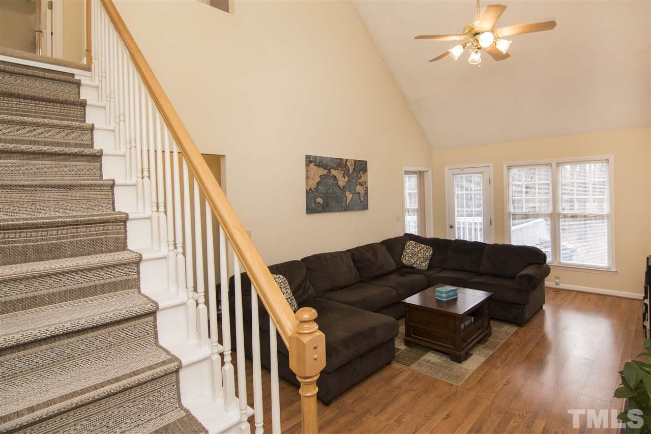 4416 Emmit Drive Raleigh, NC 27604 - Photo 5 of 28 a living room with furniture and wooden floor