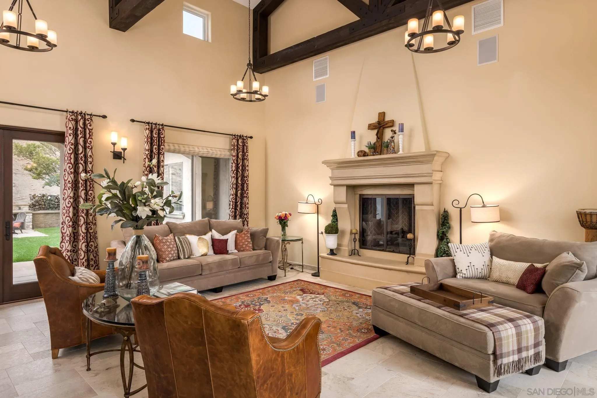 3132 Via Asoleado Alpine, CA 91901 - Photo 12 of 58 a living room with furniture a chandelier and a fireplace