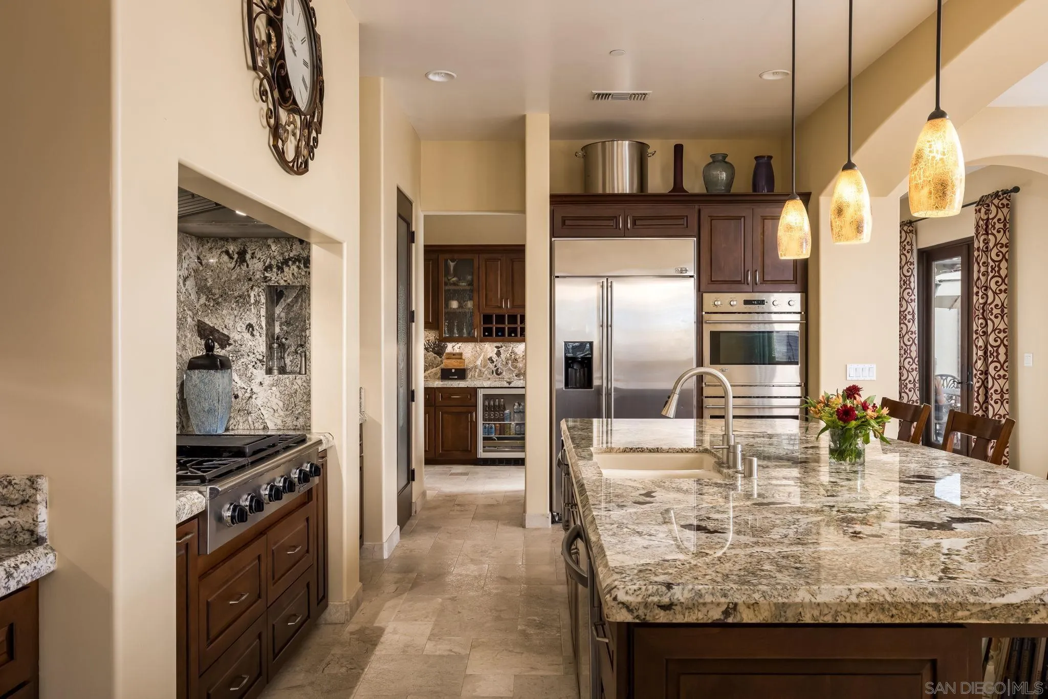 3132 Via Asoleado Alpine, CA 91901 - Photo 15 of 58 a kitchen with stainless steel appliances granite countertop a sink and a refrigerator