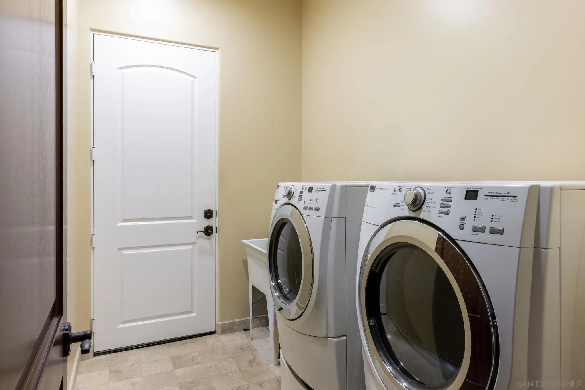 3132 Via Asoleado Alpine, CA 91901 - Photo 31 of 58 a utility room with dryer and washer