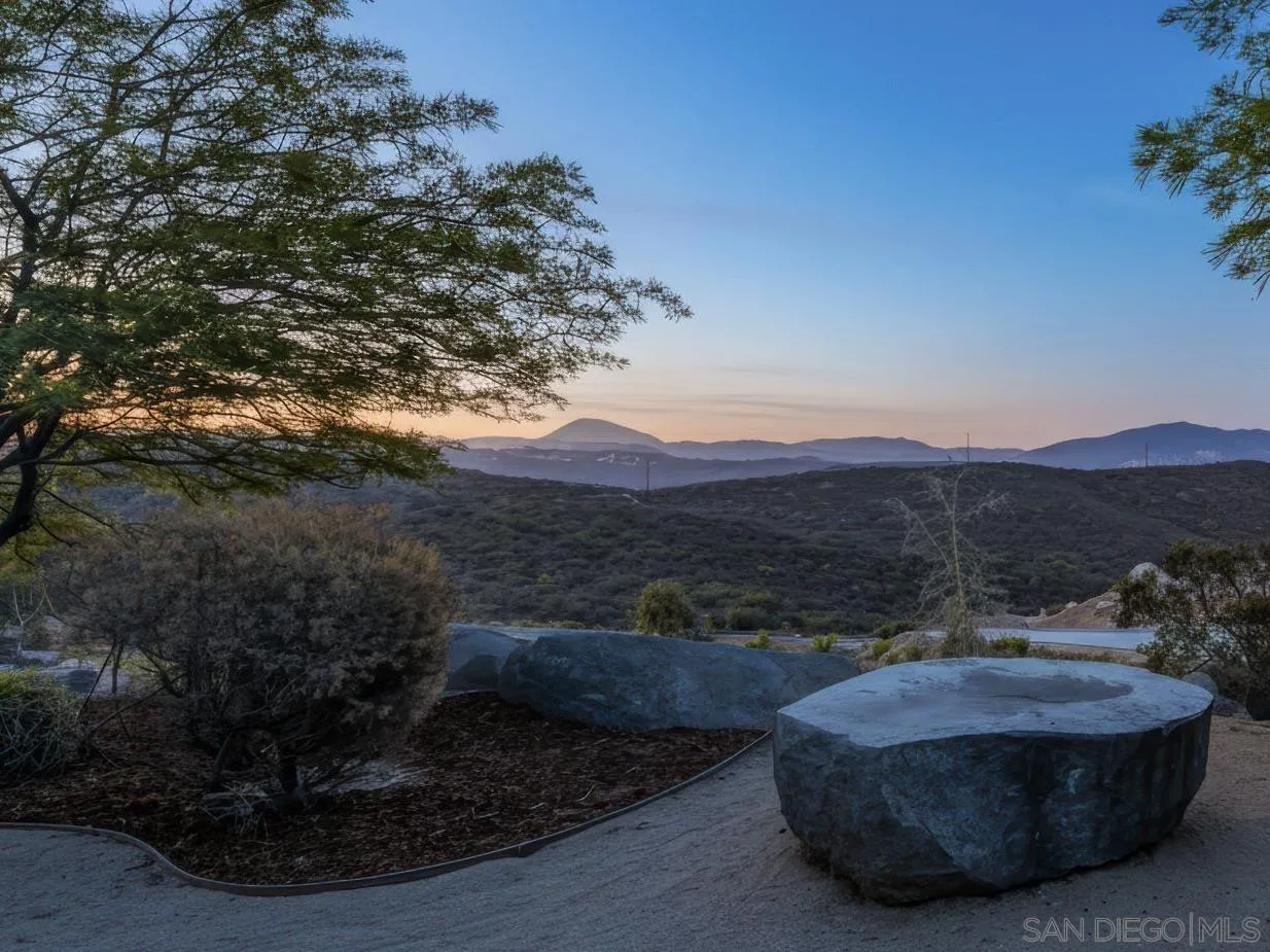 3132 Via Asoleado Alpine, CA 91901 - Photo 4 of 58 a view of a house with a yard and mountain view