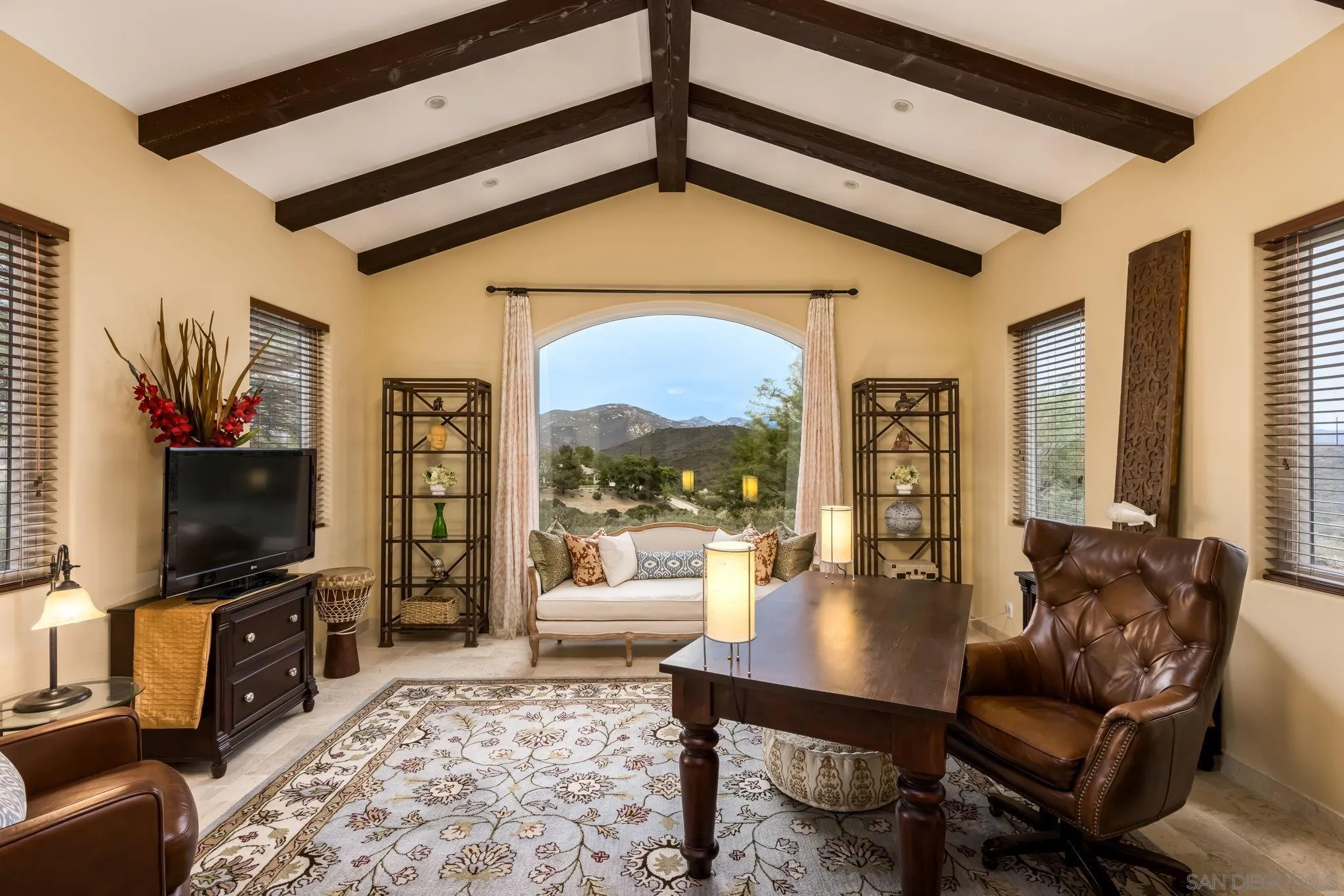 3132 Via Asoleado Alpine, CA 91901 - Photo 9 of 58 a living room with furniture a flat screen tv and a floor to ceiling window