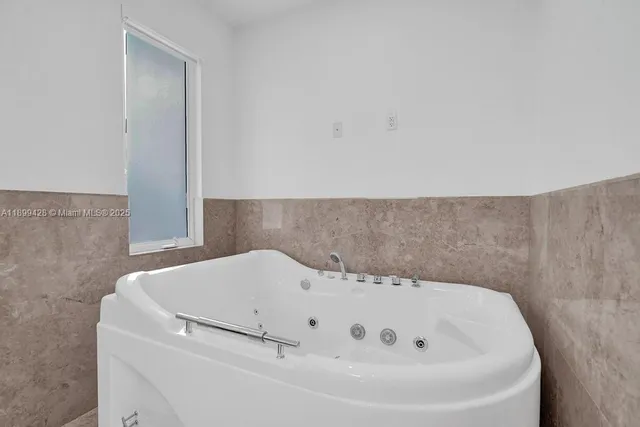 a view of swimming pool with outdoor seating