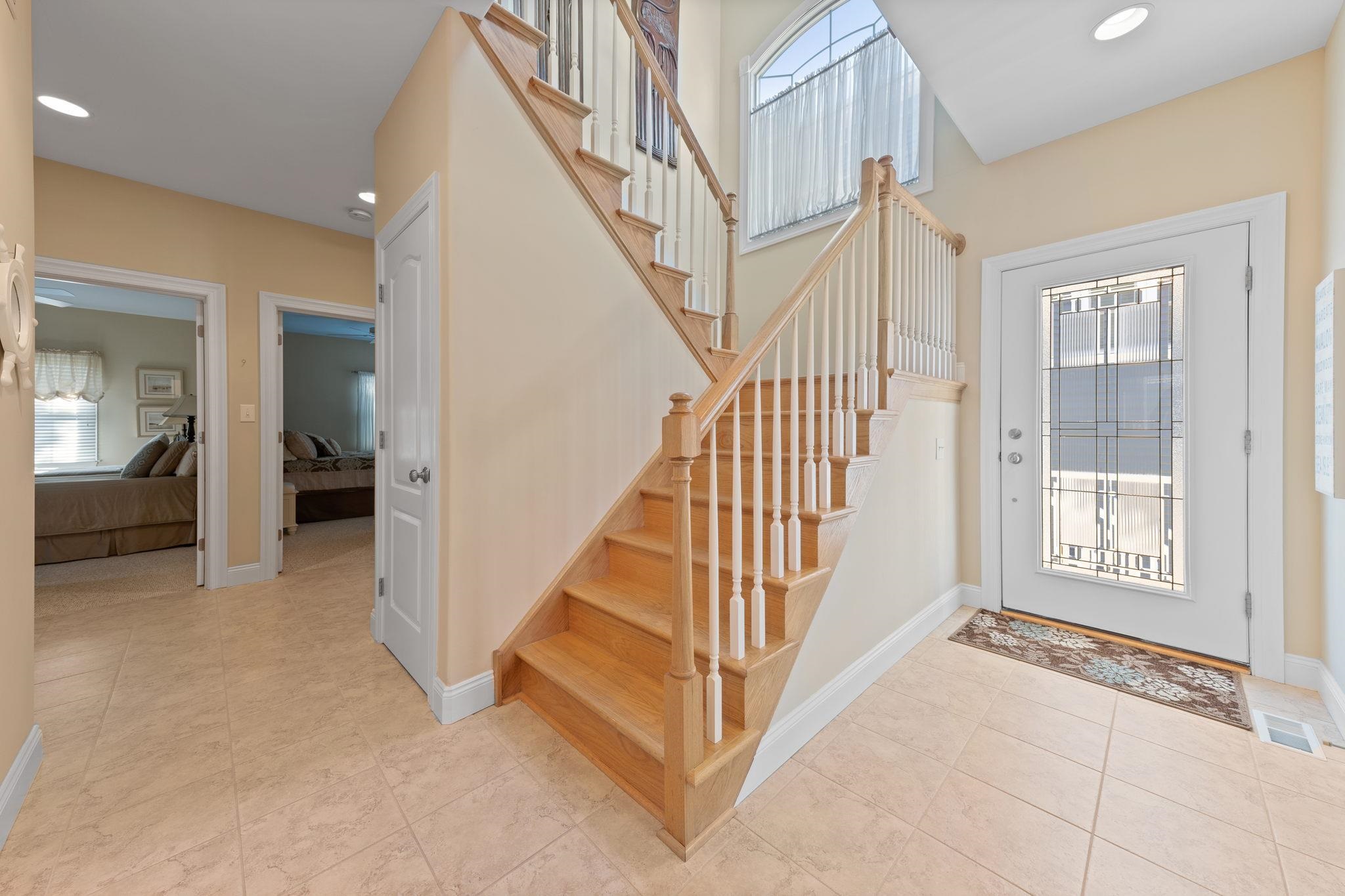 244 23rd Street Avalon, NJ 08202 - Photo 2 of 21 a view of an entryway with staircase
