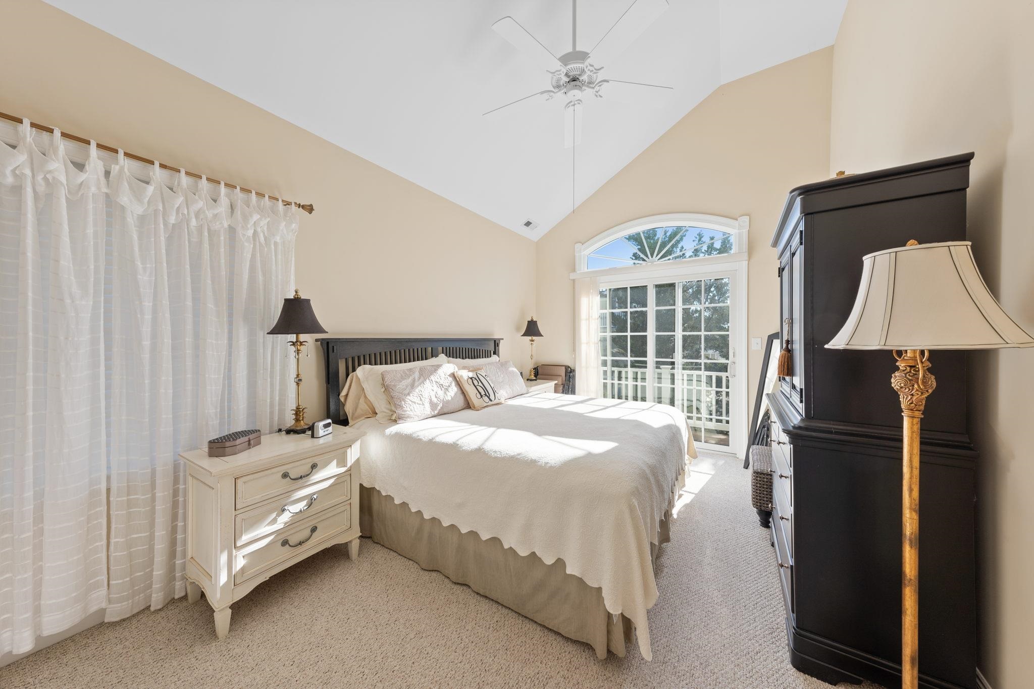 244 23rd Street Avalon, NJ 08202 - Photo 12 of 21 a bedroom with a bed dresser and a window