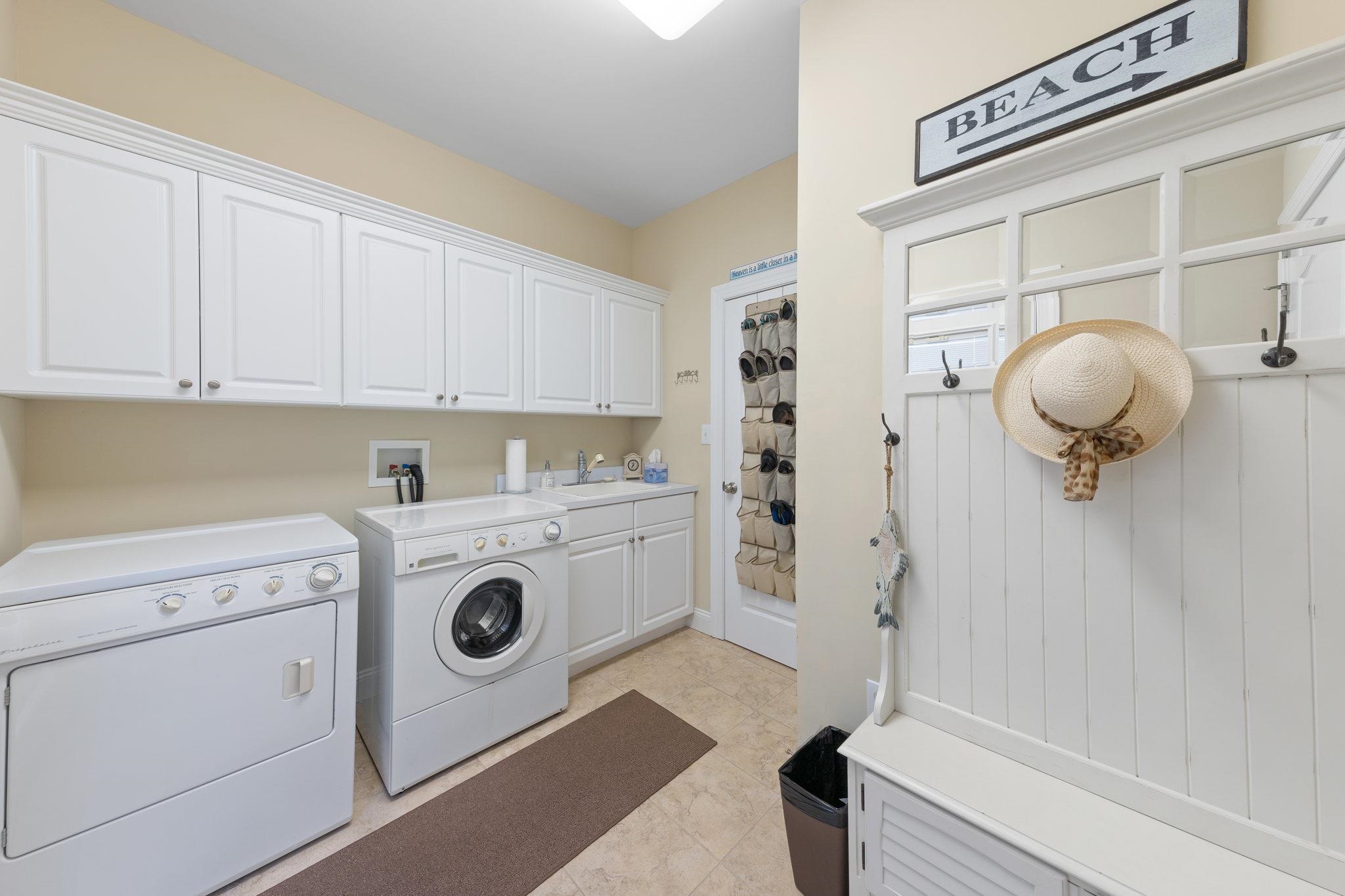 244 23rd Street Avalon, NJ 08202 - Photo 19 of 21 a view of kitchen and washer and dryer