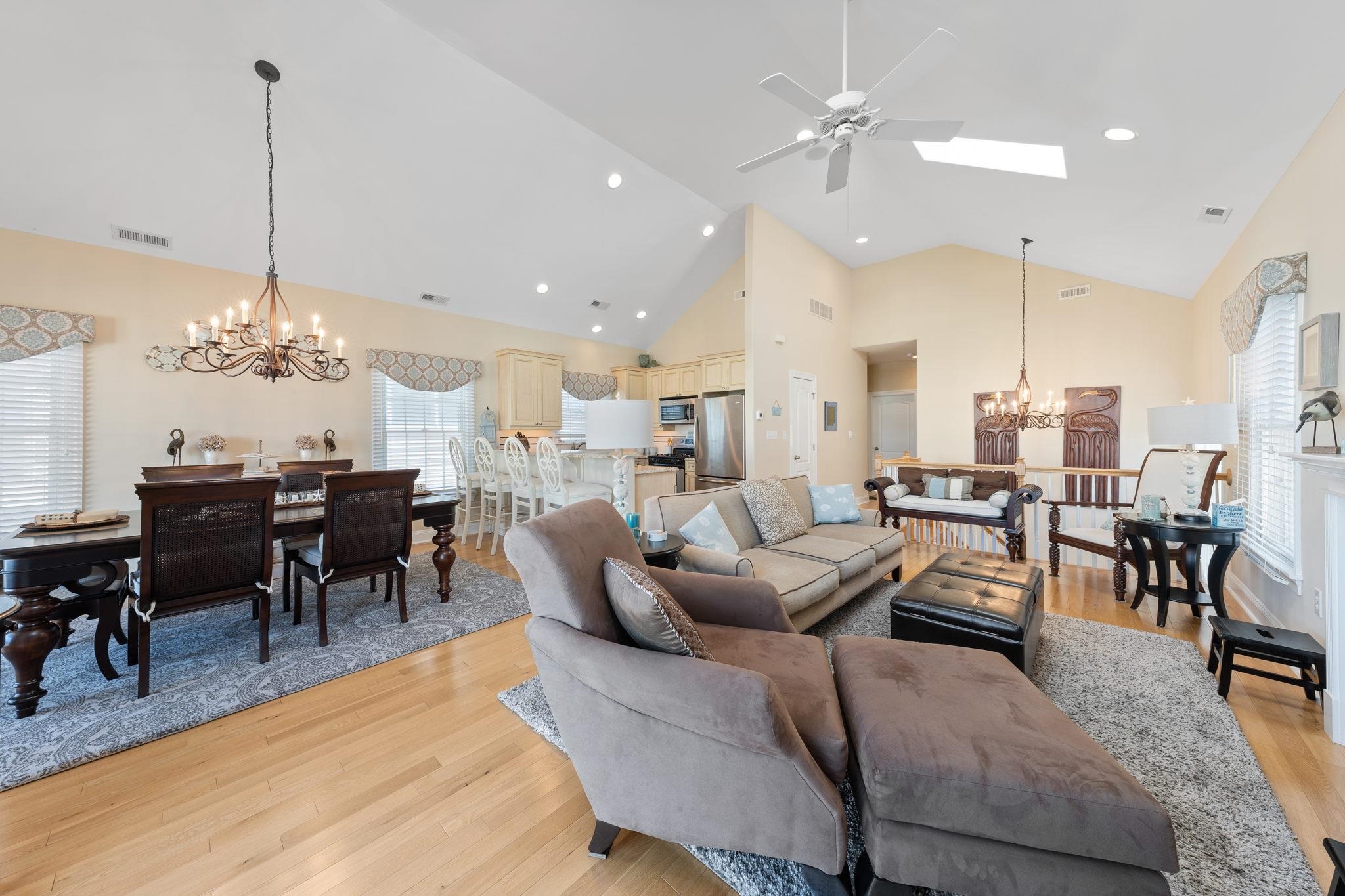 244 23rd Street Avalon, NJ 08202 - Photo 4 of 21 a living room with furniture kitchen view and a chandelier