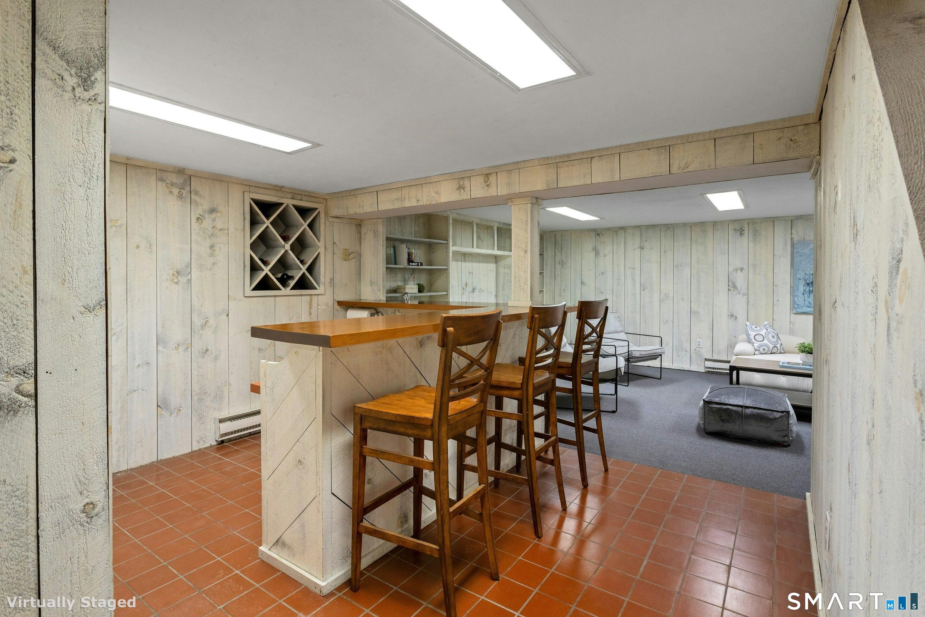 2 Pheasant Run Road Wilton, CT 06897 - Photo 24 of 31 Bar area looking into Family Room/Game Room