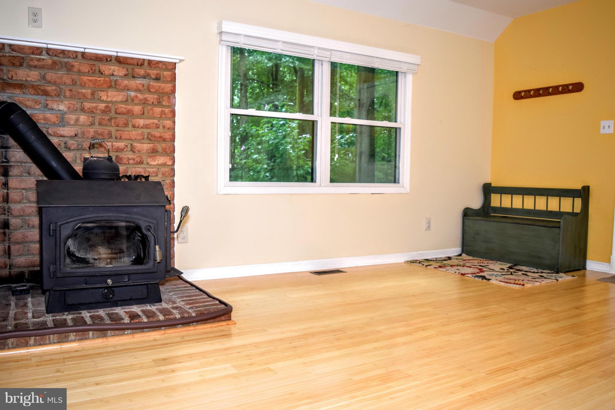 512 Plumtree Road Bel Air, MD 21015 - Photo 8 of 30 Family Room w/ Wood Stove for Economic Comfort!