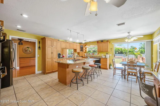 a view of a dining area with furniture window and outside view