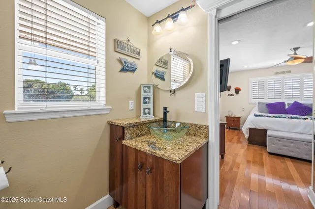 a living room with furniture rug and window
