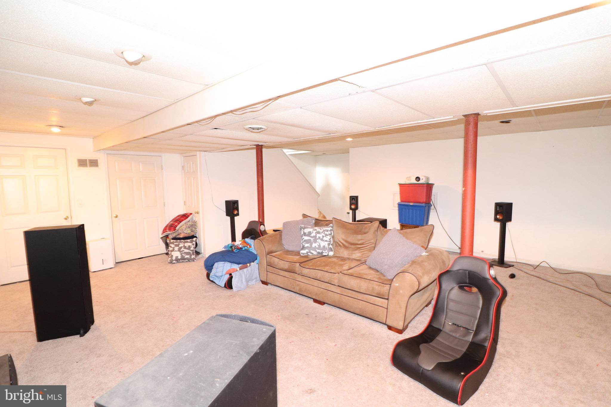 45 Dasher Avenue Bear, DE 19701 - Photo 12 of 20 a living room with furniture and a flat screen tv