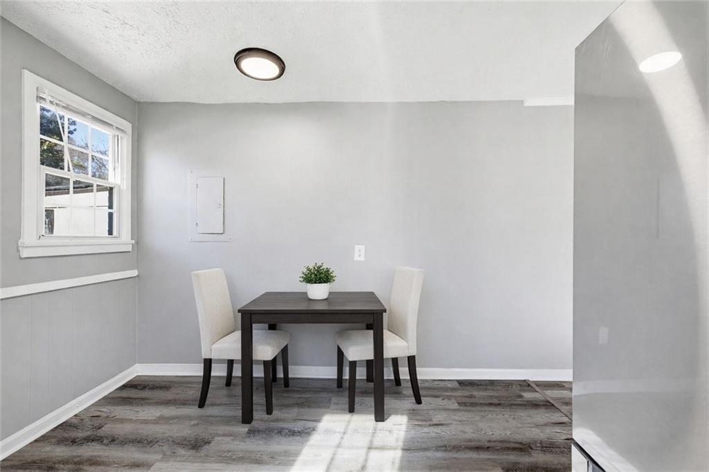 1789 Cahoon Street Southwest Atlanta, GA 30310 - Photo 5 of 15 a view of a room with furniture and wooden floor