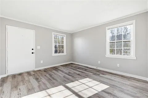 an empty room with windows