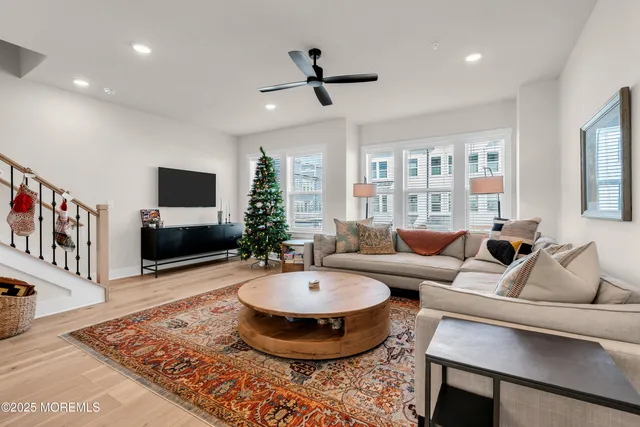 front view of a brick building with a swimming pool