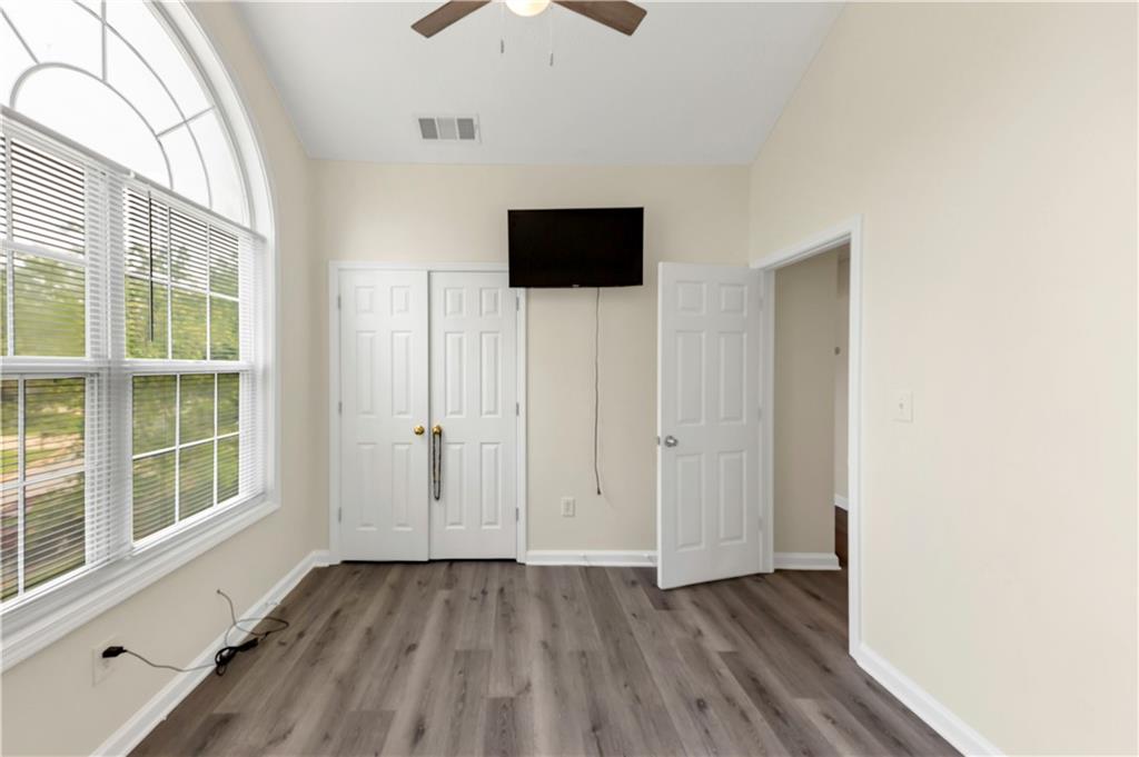 2880 Field Spring Drive Lithonia, GA 30058 - Photo 21 of 31 a view of a livingroom with an empty space and a window