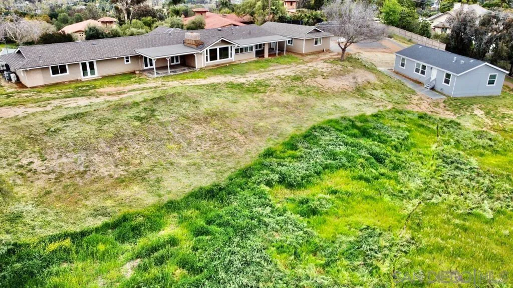 13822 Northcrest Lane Poway, CA 92064 - Photo 4 of 26 an aerial view of residential houses with yard