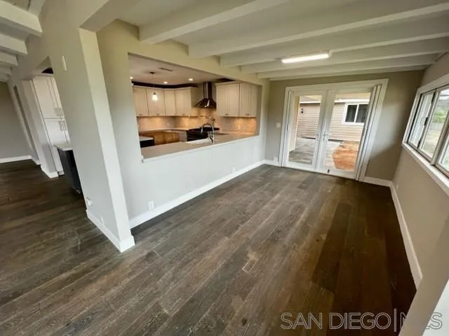 13822 Northcrest Lane Poway, CA 92064 - Photo 7 of 26 a view of a kitchen cabinets and wooden floor