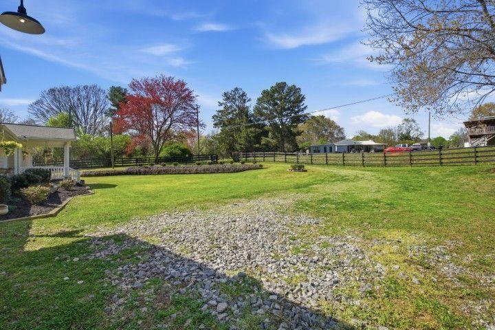 2215 Roper Road Cumming, GA 30028 - Photo 15 of 24 a view of a park with large trees