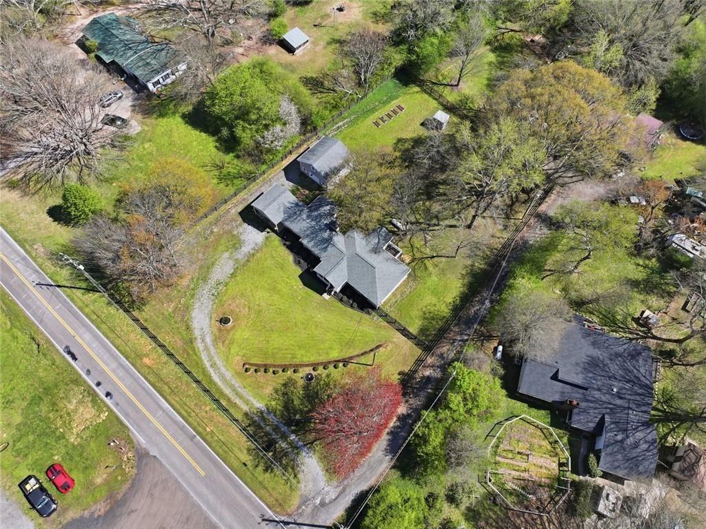 2215 Roper Road Cumming, GA 30028 - Photo 17 of 24 an aerial view of a residential houses with outdoor space