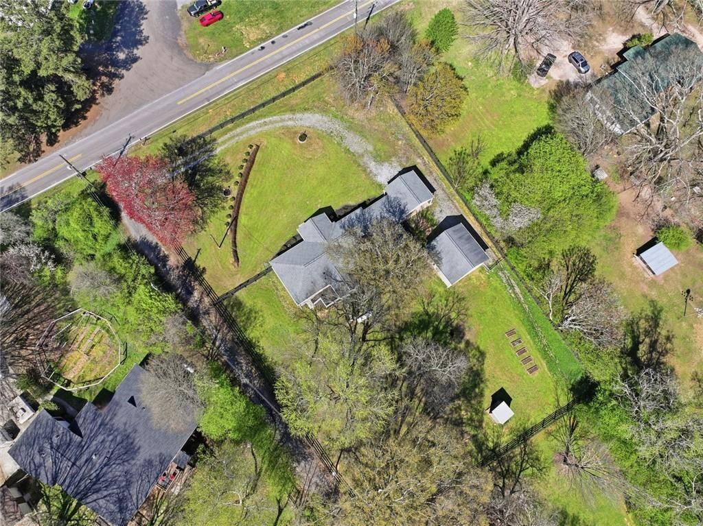 2215 Roper Road Cumming, GA 30028 - Photo 18 of 24 a view of a garden