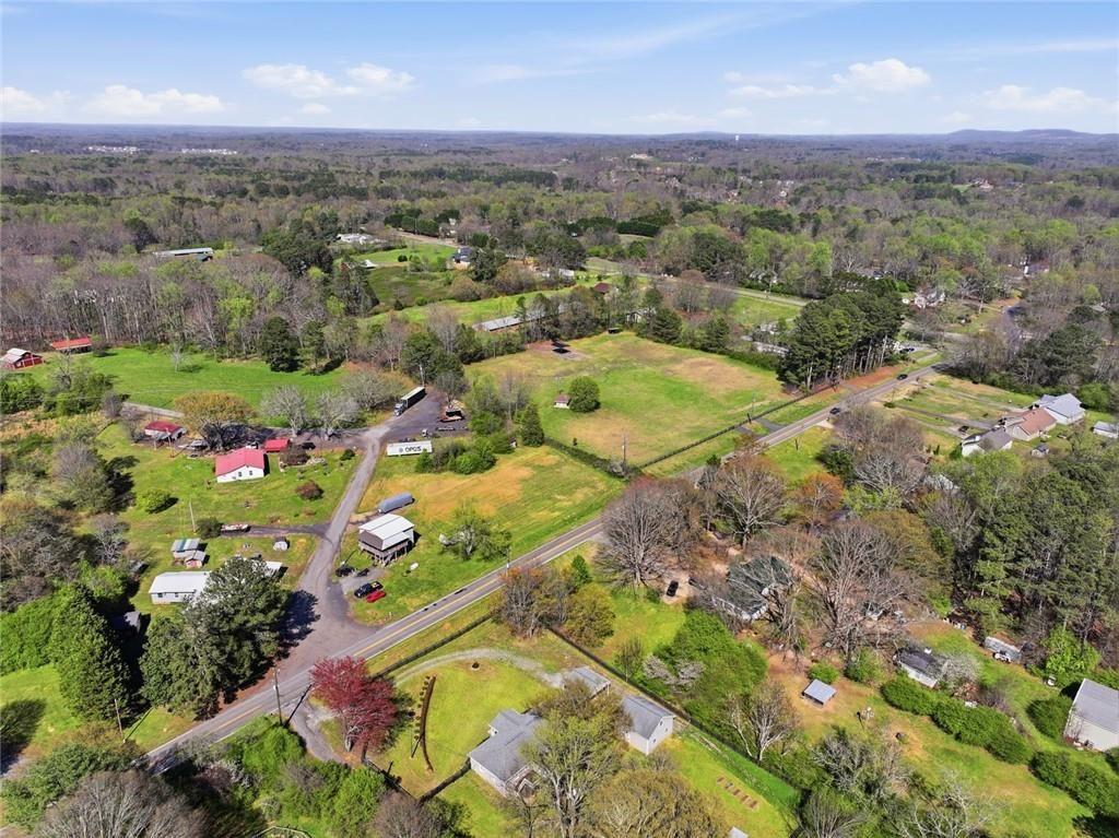 2215 Roper Road Cumming, GA 30028 - Photo 22 of 24 an aerial view of residential houses with outdoor space