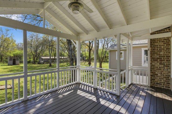 2215 Roper Road Cumming, GA 30028 - Photo 9 of 24 a view of a balcony with wooden floor