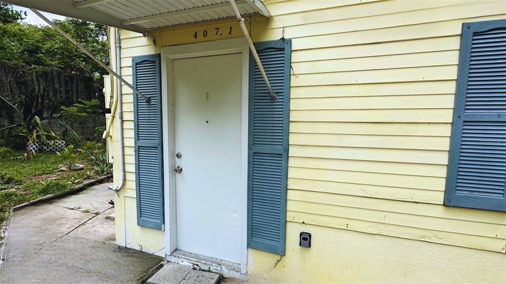 407 Poinsettia Road Daytona Beach, FL 32118 - Photo 2 of 10 a view of a door and a outdoor space