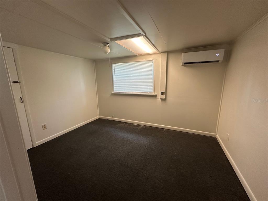 407 Poinsettia Road Daytona Beach, FL 32118 - Photo 7 of 10 a view of an empty room