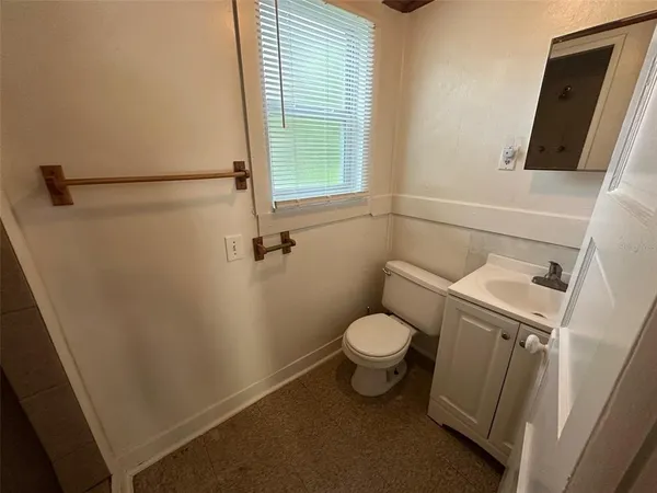 a bathroom with a sink and a toilet