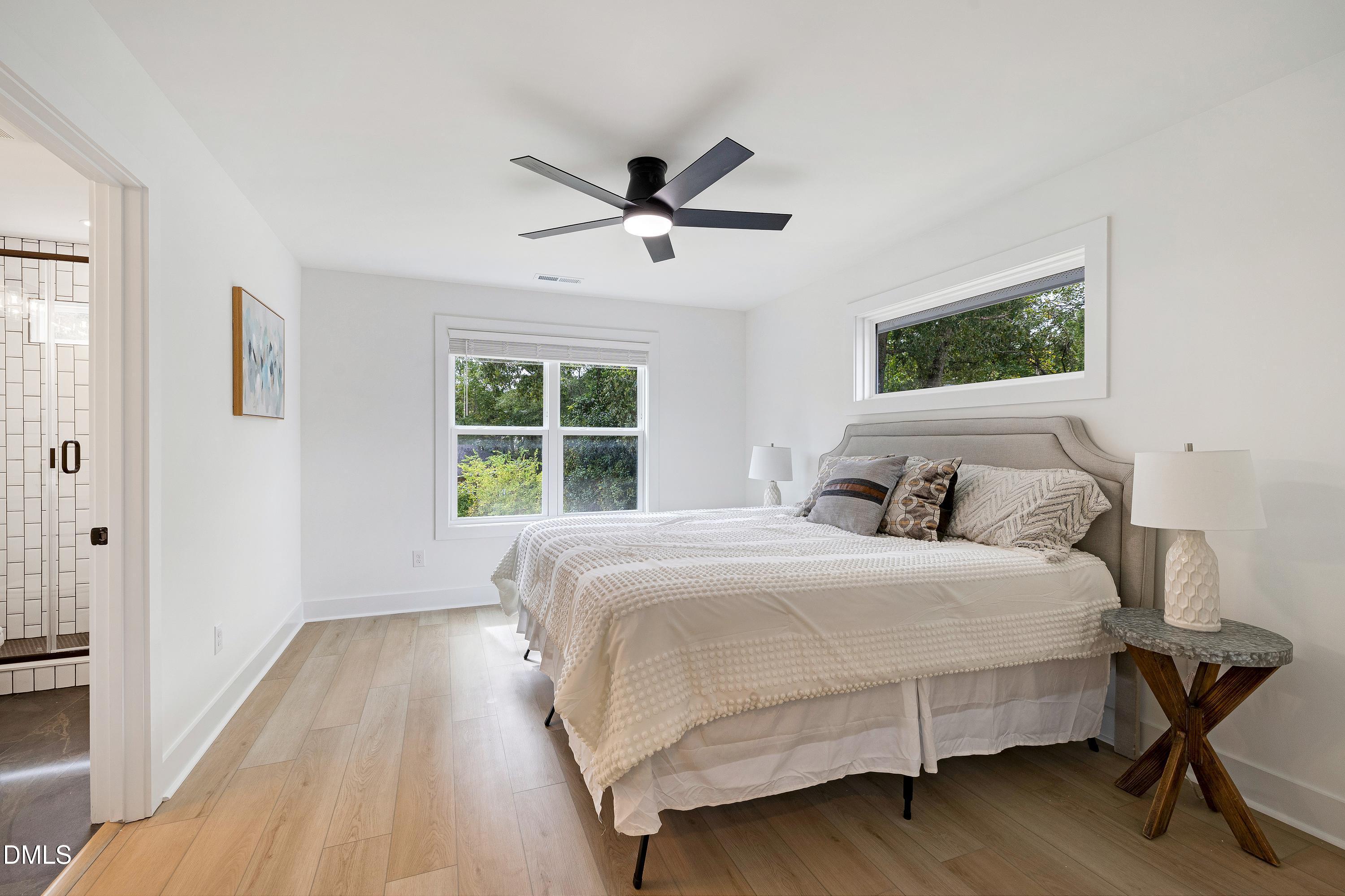 1418 Joe Louis Avenue Raleigh, NC 27610 - Photo 23 of 49 a bedroom with a bed and a window