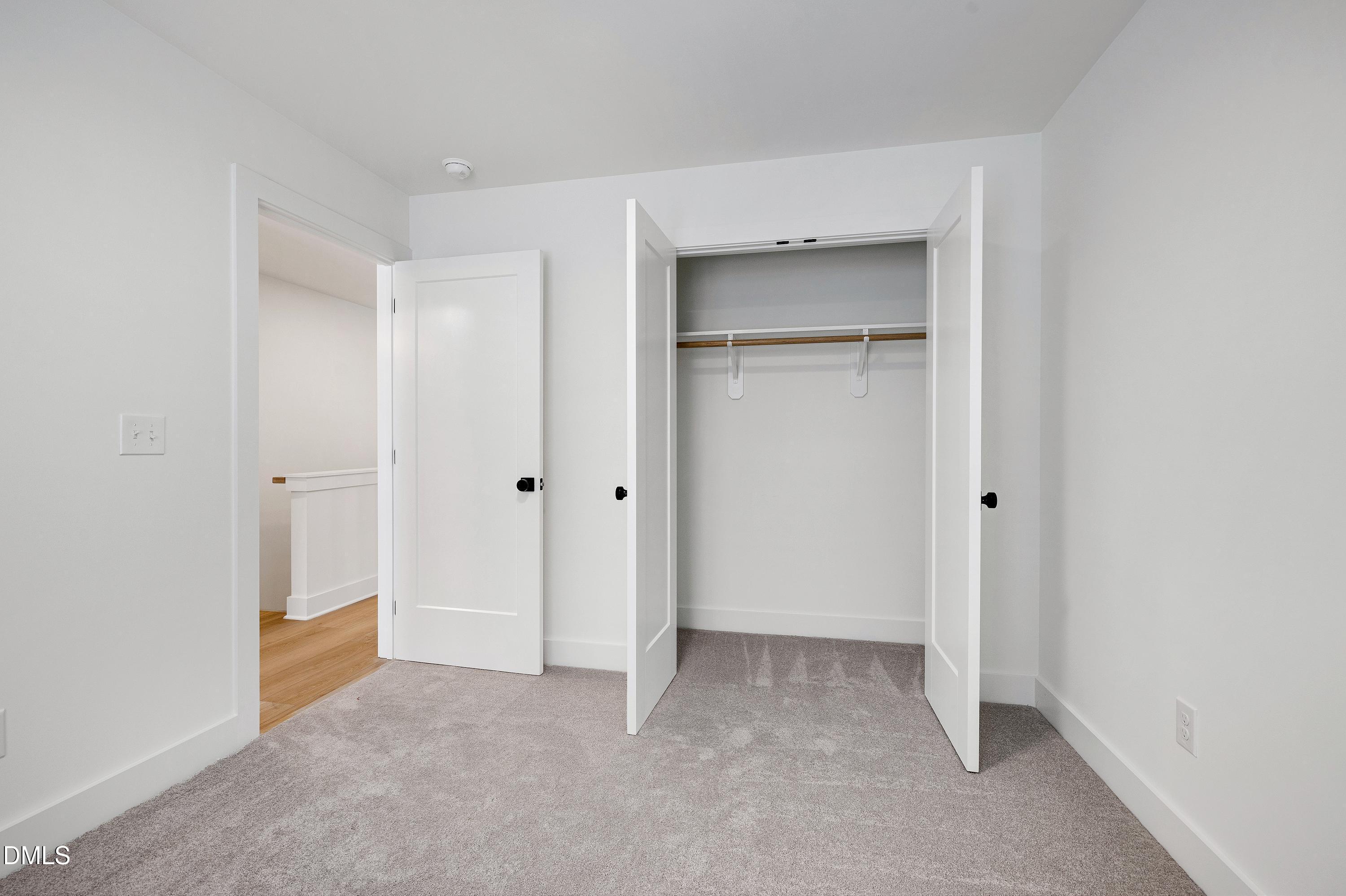 1418 Joe Louis Avenue Raleigh, NC 27610 - Photo 32 of 49 a view of an empty room and closet area