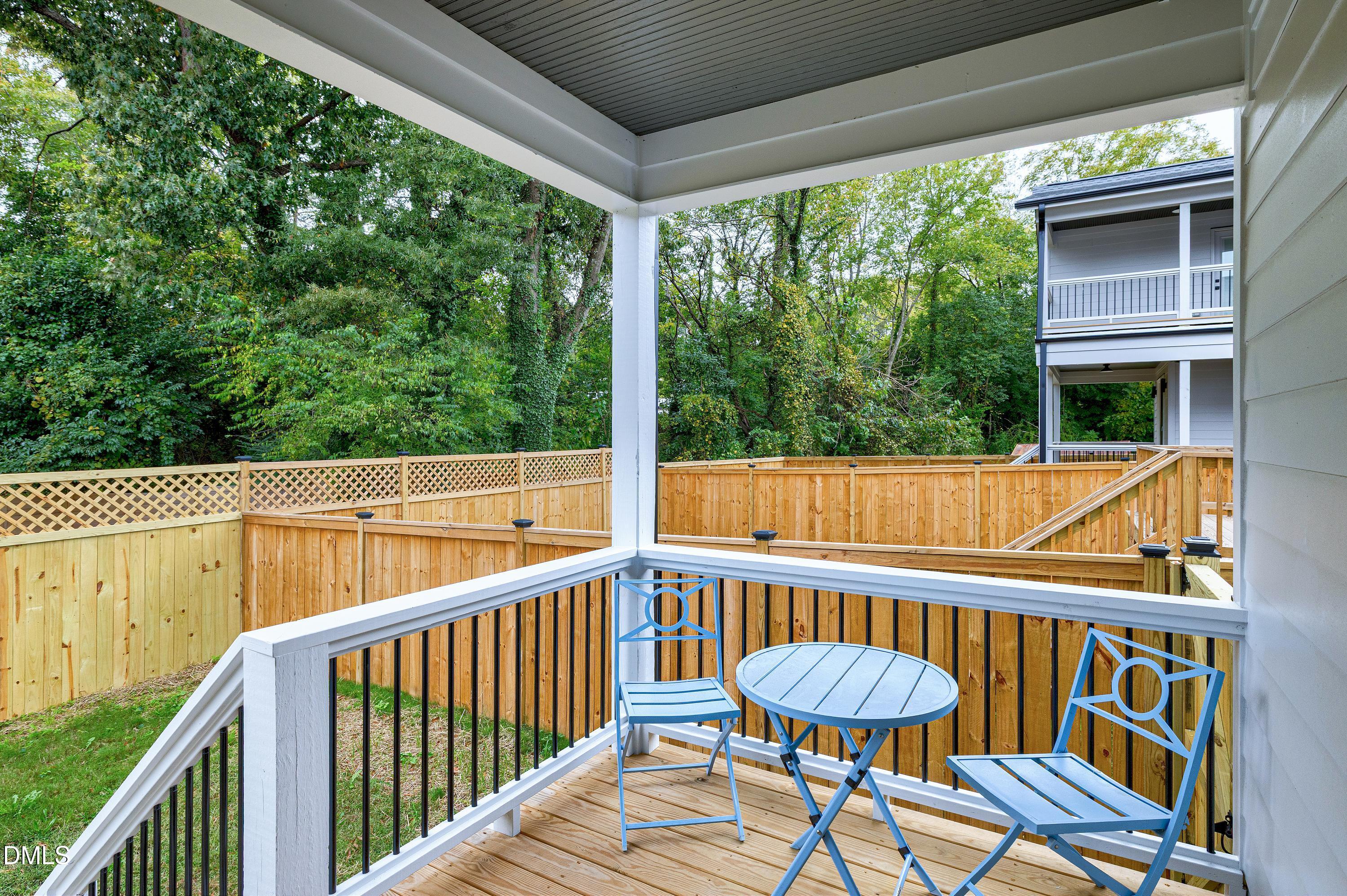 1418 Joe Louis Avenue Raleigh, NC 27610 - Photo 38 of 49 a view of a chair and table in the balcony