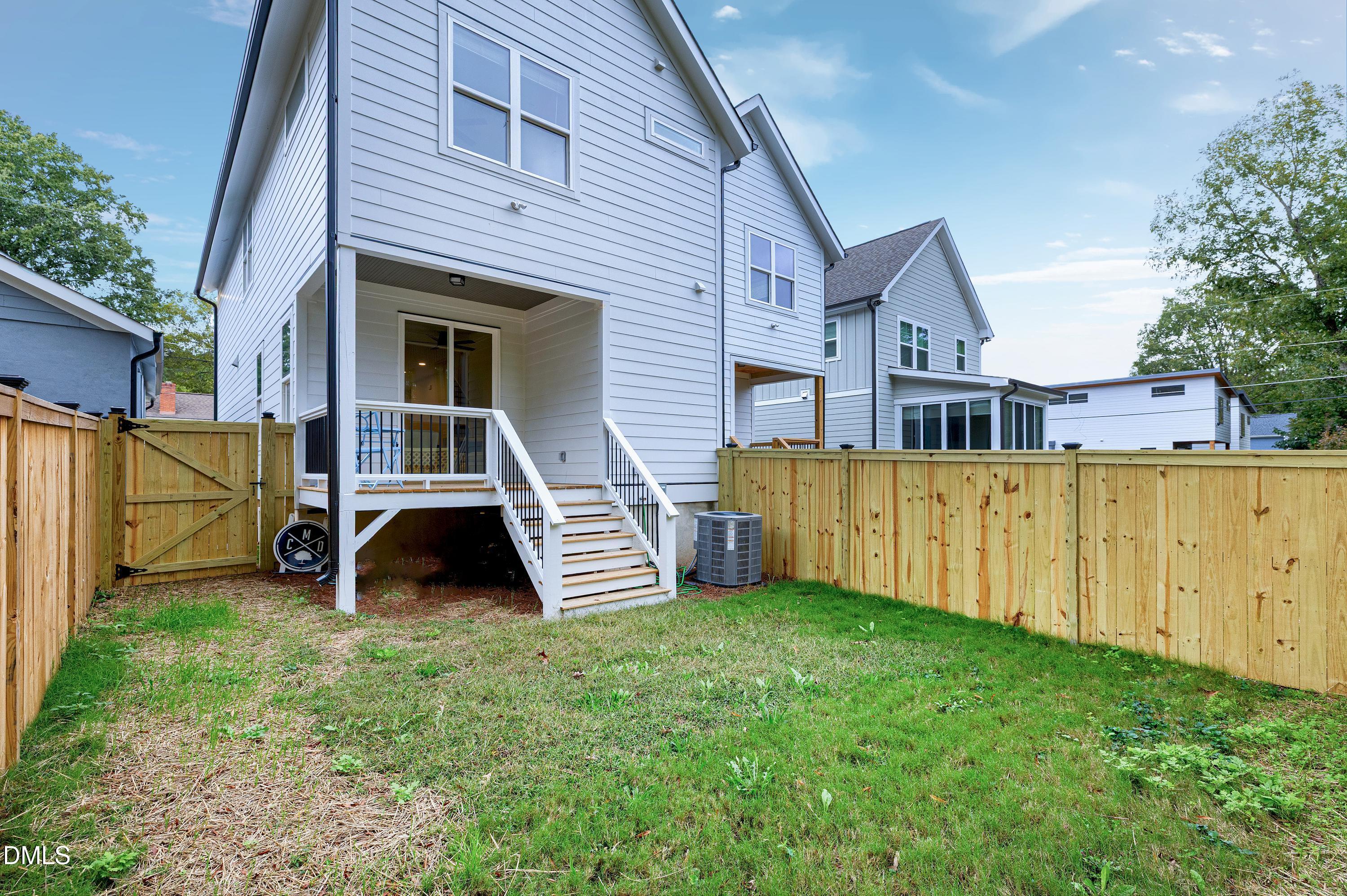 1418 Joe Louis Avenue Raleigh, NC 27610 - Photo 44 of 49 a view of a house with backyard