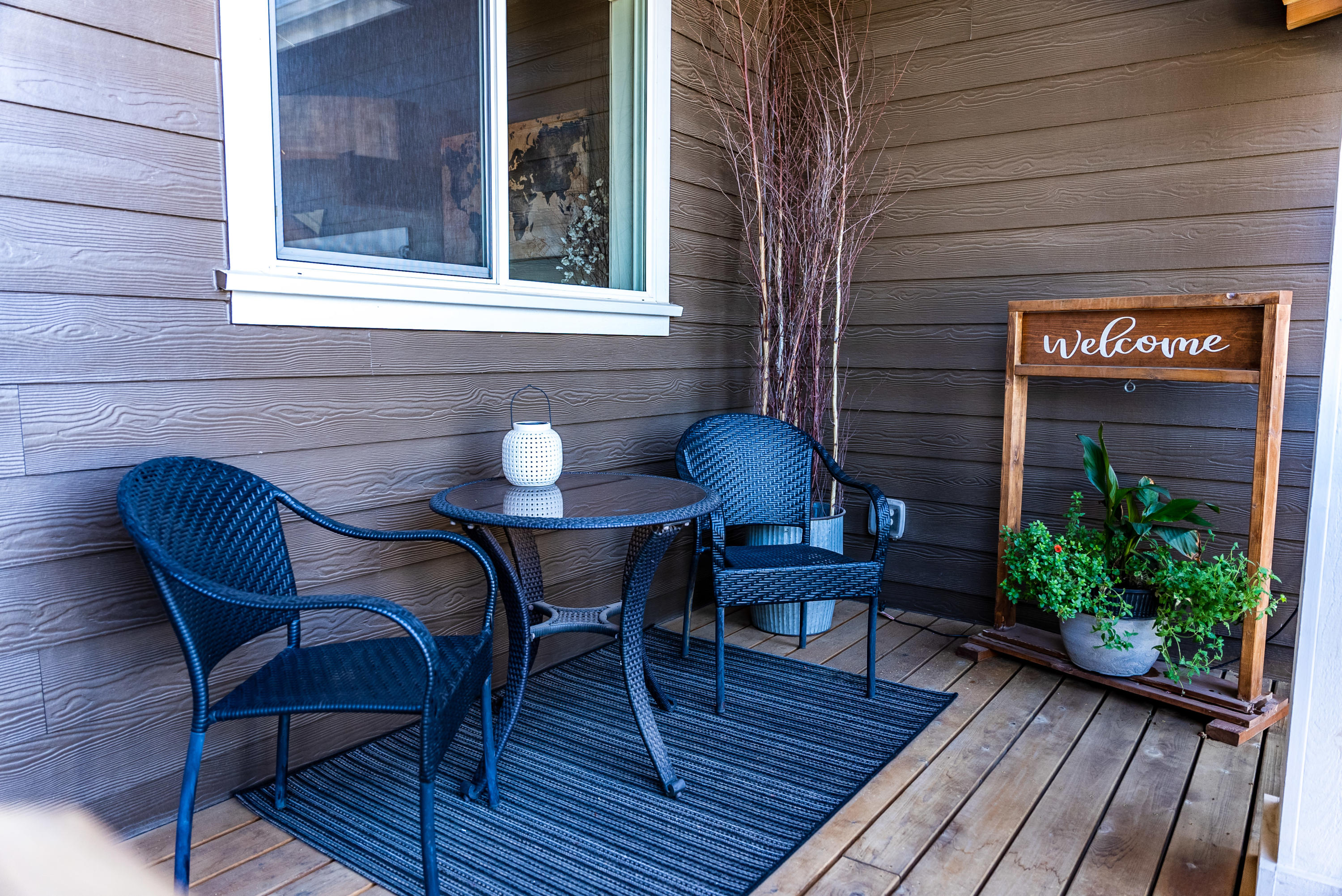 19525 Apache Road Bend, OR 97702 - Photo 32 of 47 a wooden bench sitting in front of a building