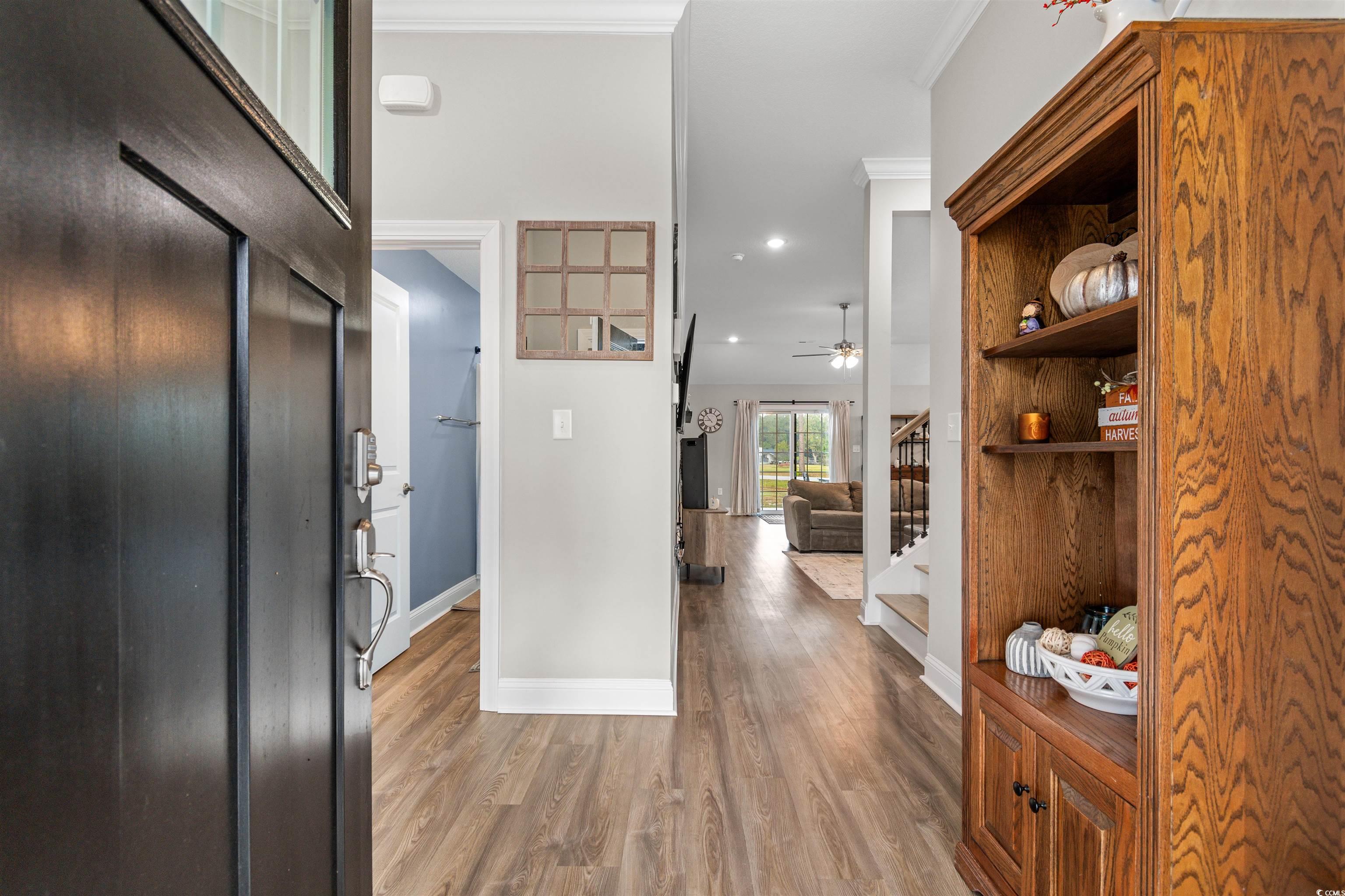 2299 Vaught Road Galivants Ferry, SC 29544 - Photo 2 of 40 Foyer with ceiling fan, hardwood / wood-style floo