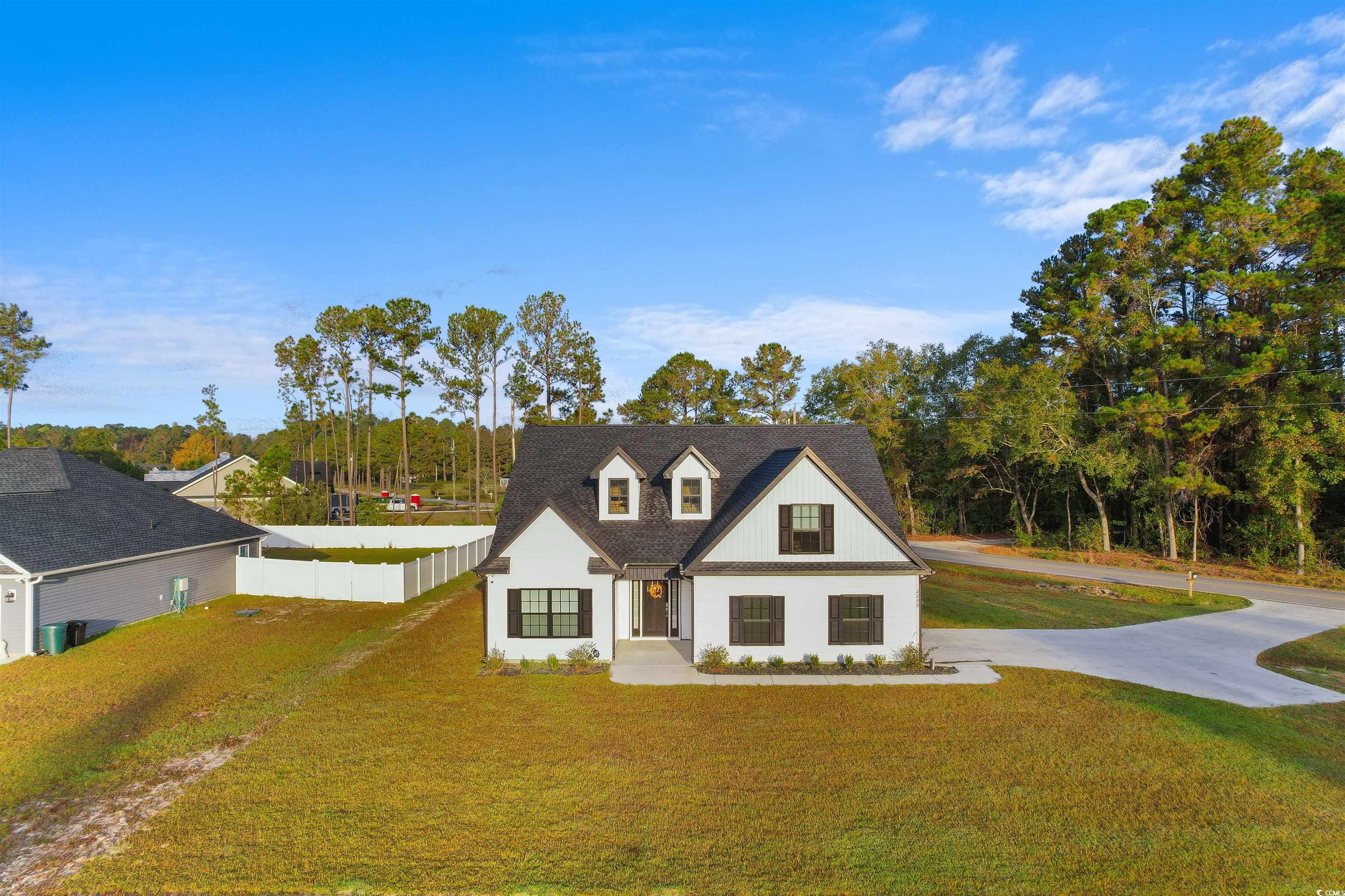 2299 Vaught Road Galivants Ferry, SC 29544 - Photo 38 of 40 View of front of property with a front lawn