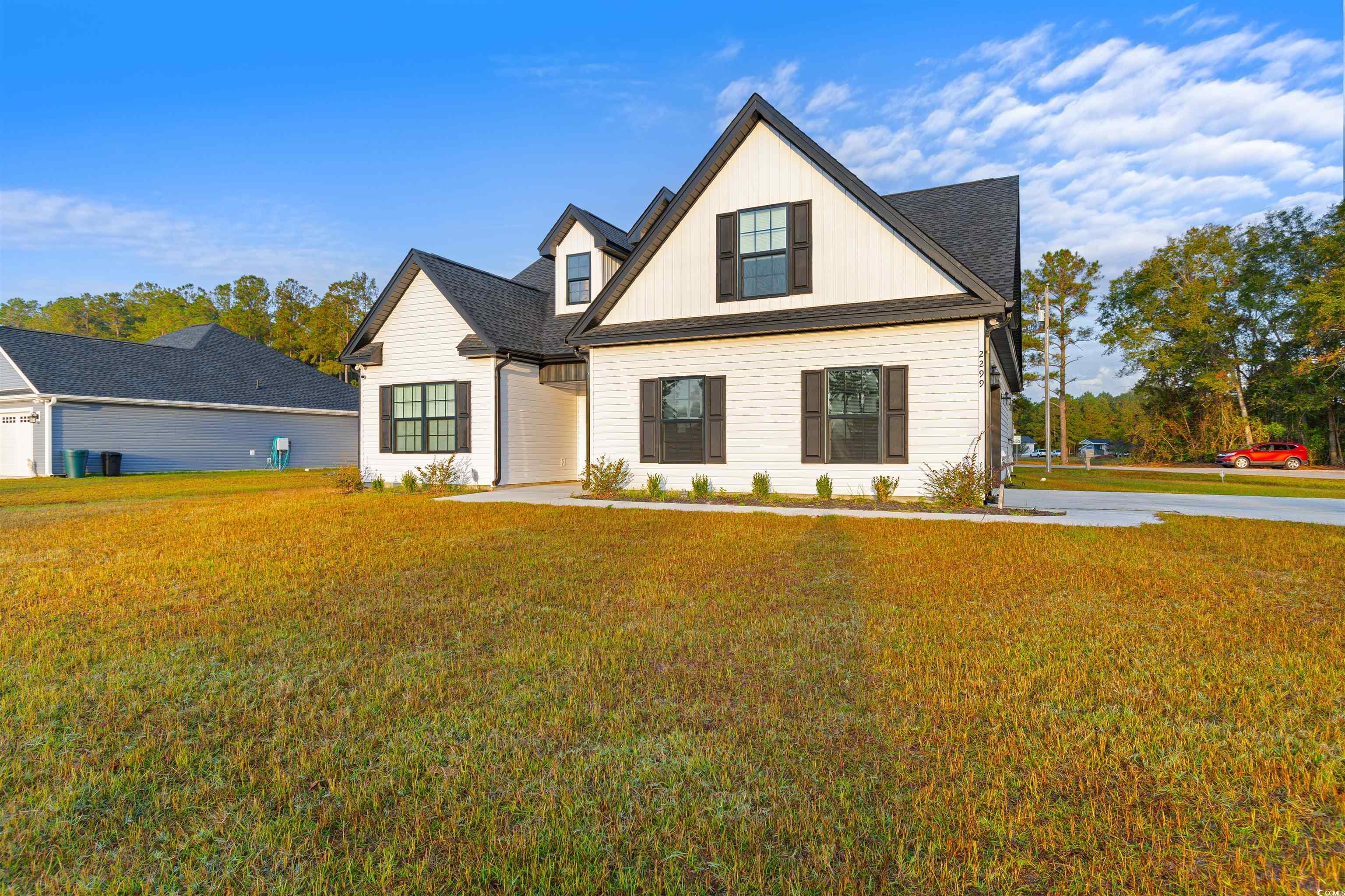2299 Vaught Road Galivants Ferry, SC 29544 - Photo 40 of 40 View of front facade featuring a front yard