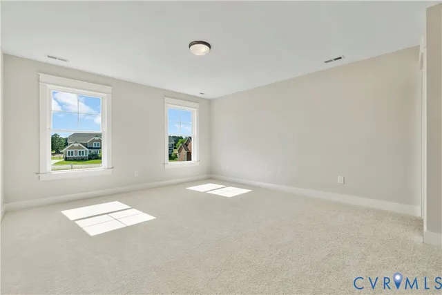 a bathroom with a double vanity sink a mirror and shower
