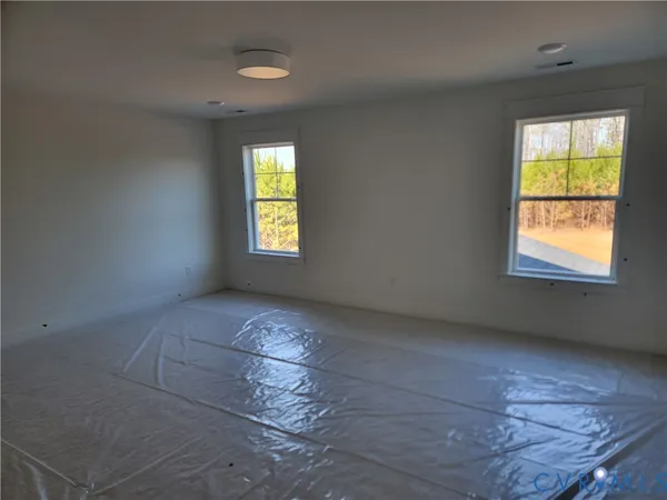 an empty room with windows