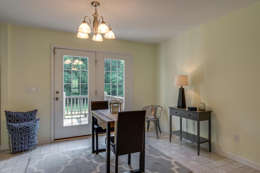 1427 St Paul Road Charlotte, TN 37036 - Photo 10 of 27 a dining room with furniture and window