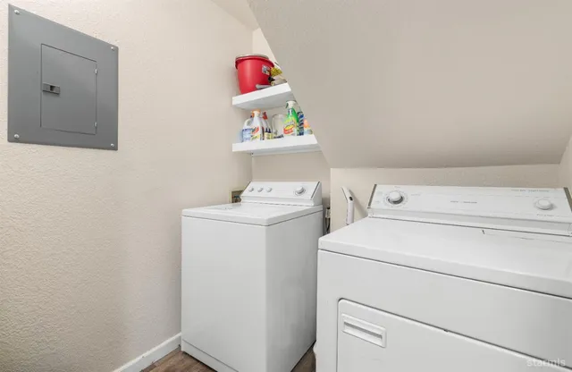 a utility room with dryer and washer